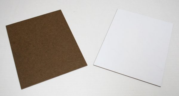 Hardboard / Markerboard: smooth wood on one side, white surface on the other side.